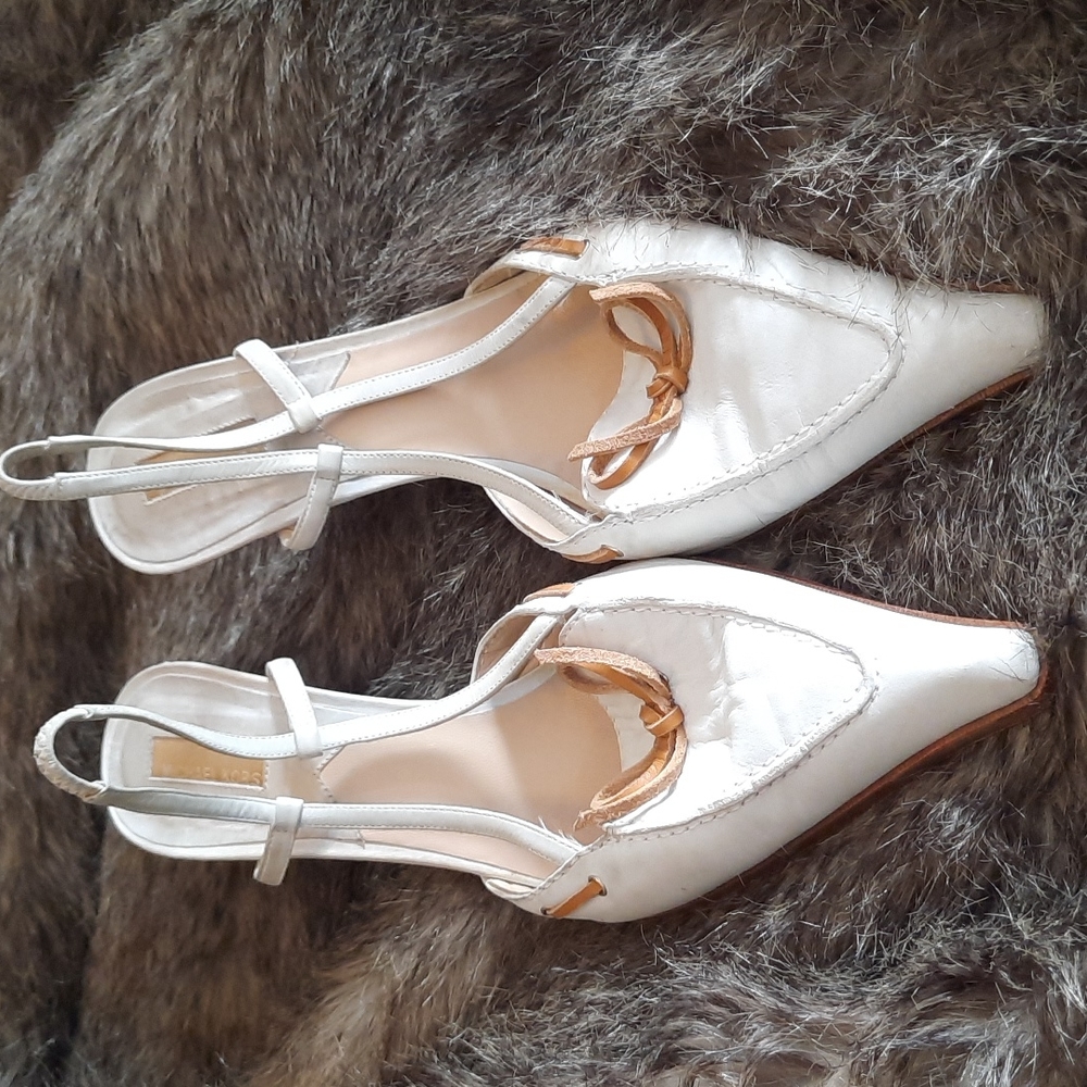 Michael Kors white loafer heel..